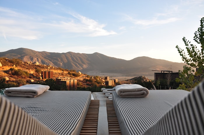 Resort poolside loungers overlooking mountains